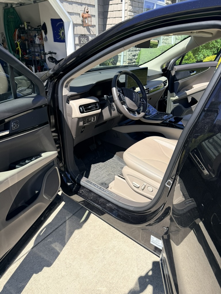 Clean car interior seats and door panel after detailing service in Berea Ohio
