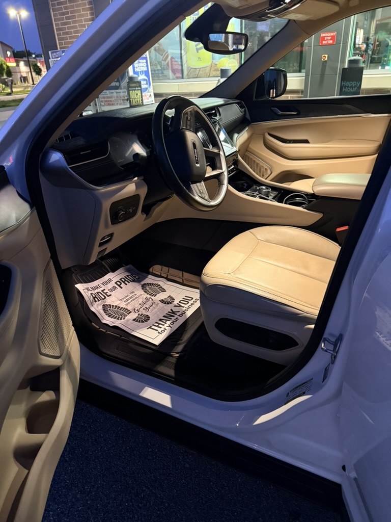 Clean front seats and center console after interior auto detailing in North Olmsted Ohio